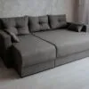 Minkštas kampas MB001324 pilkos spalvos moderniame interjere