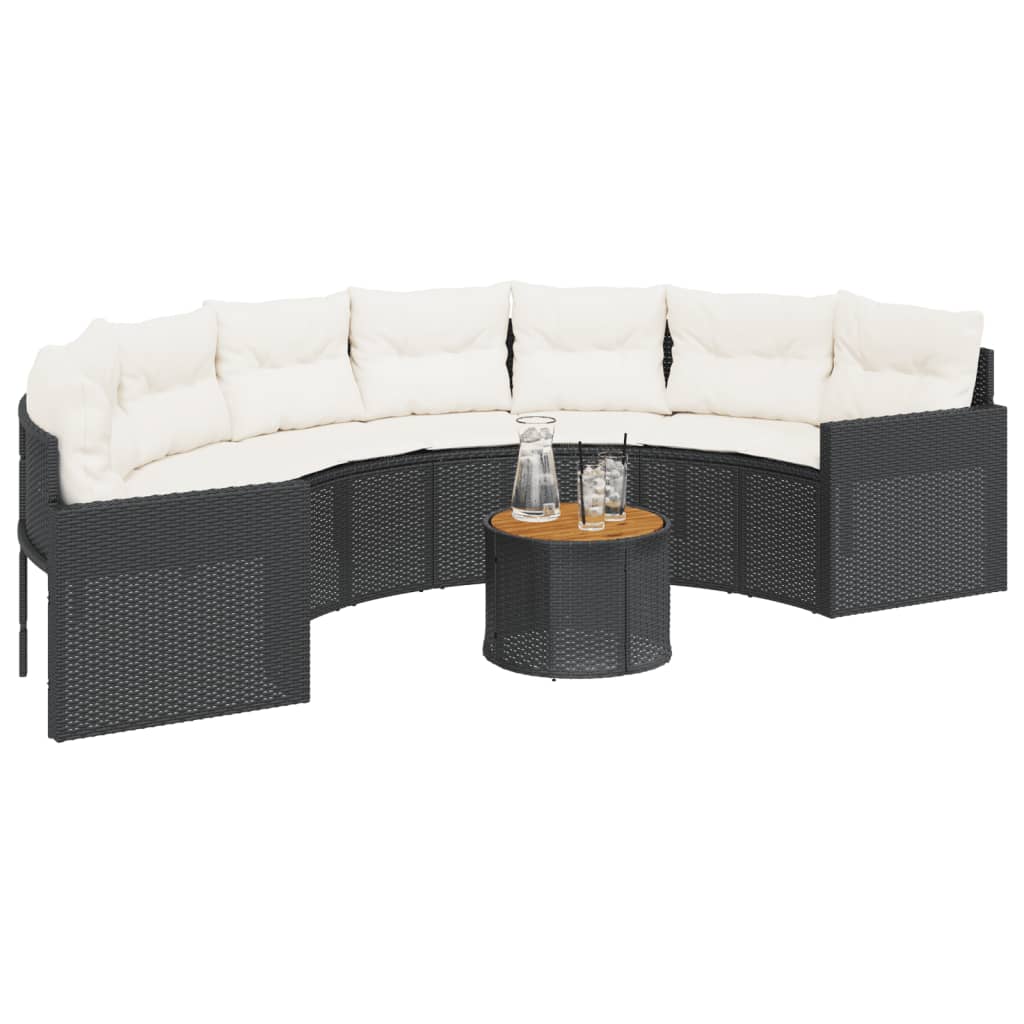 Juoda pusapvalė sodo sofa su stalu ir pagalvėlėmis