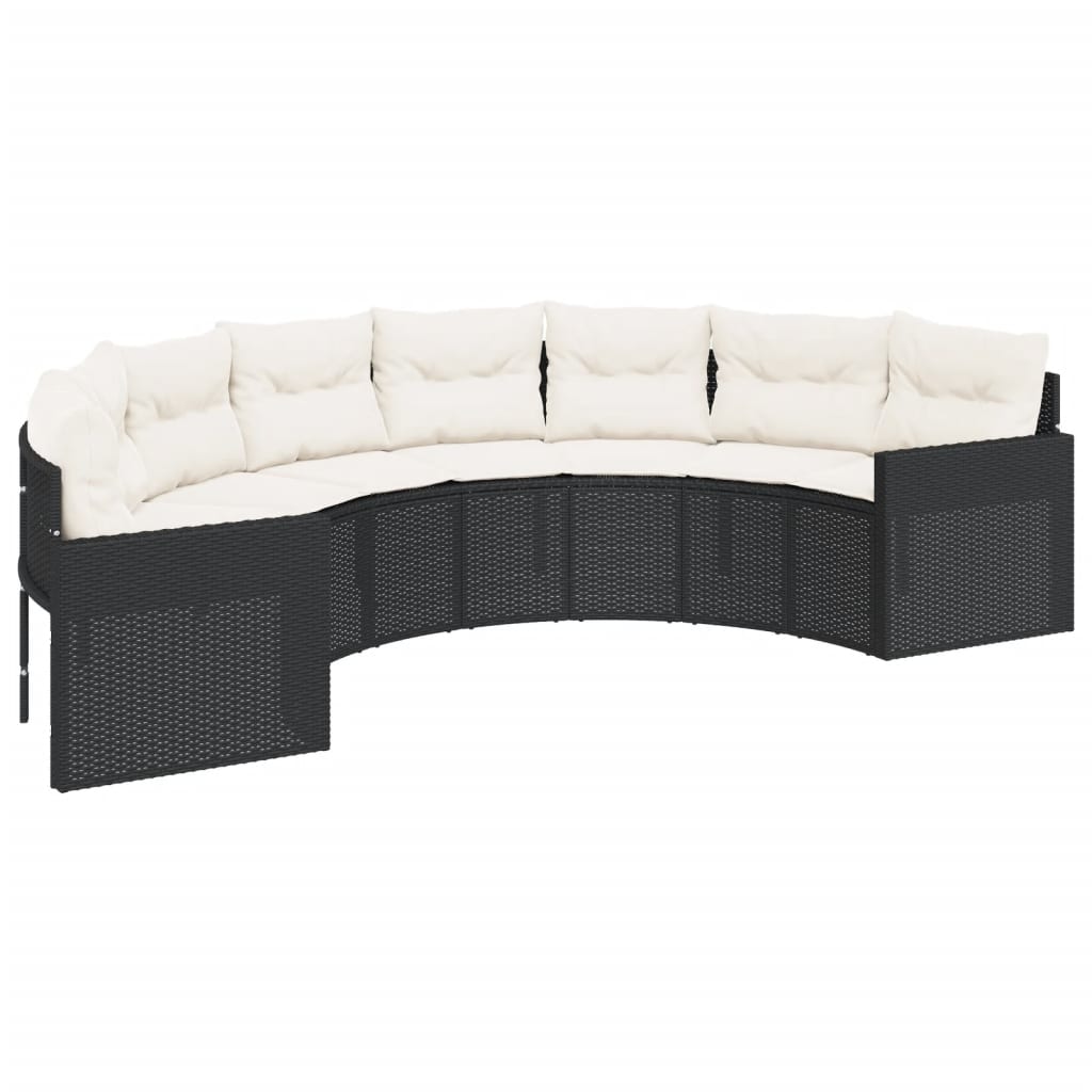 Juoda pusapvalė sodo sofa su stalu ir pagalvėlėmis