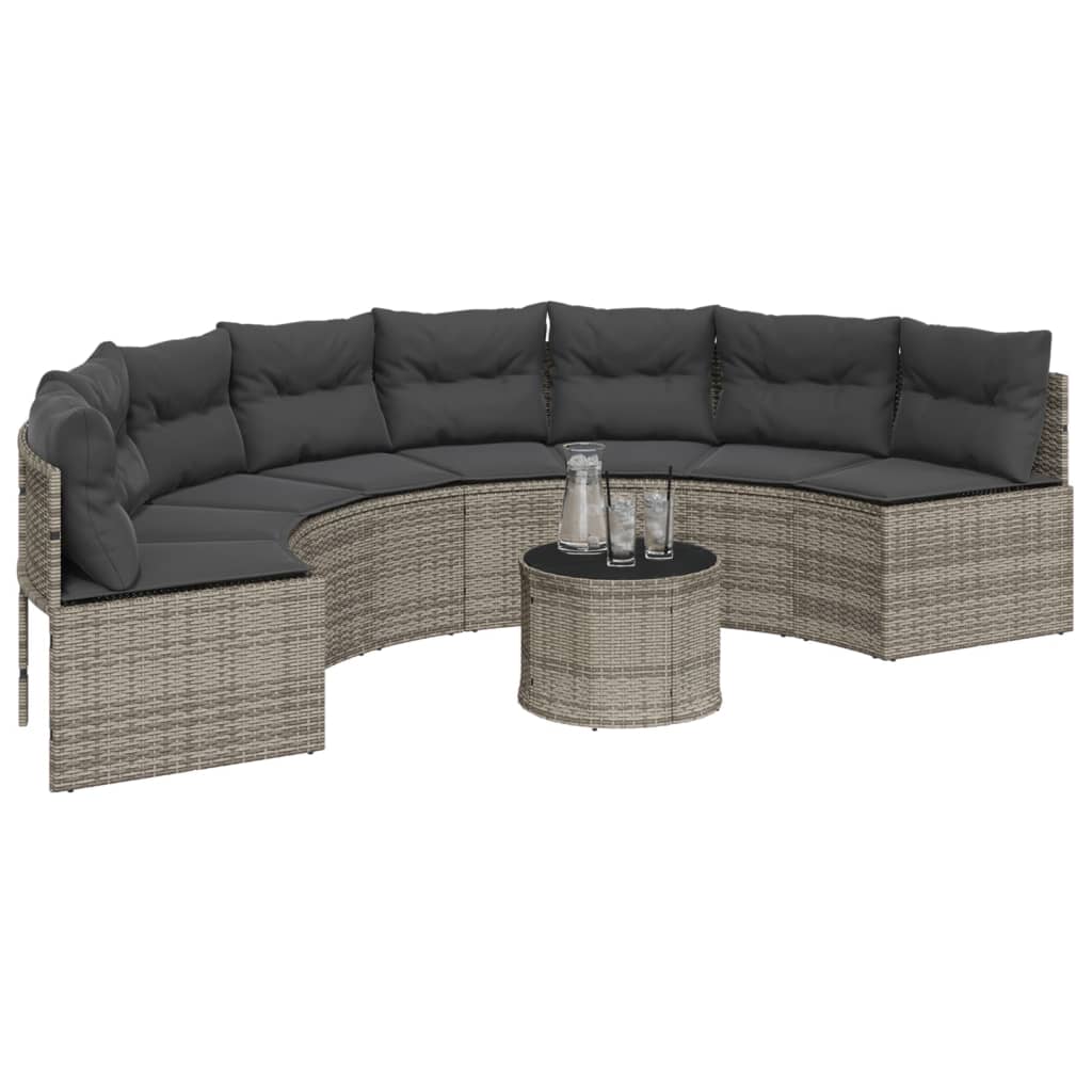Pilka pusapvalė sodo sofa su stalu ir pagalvėlėmis