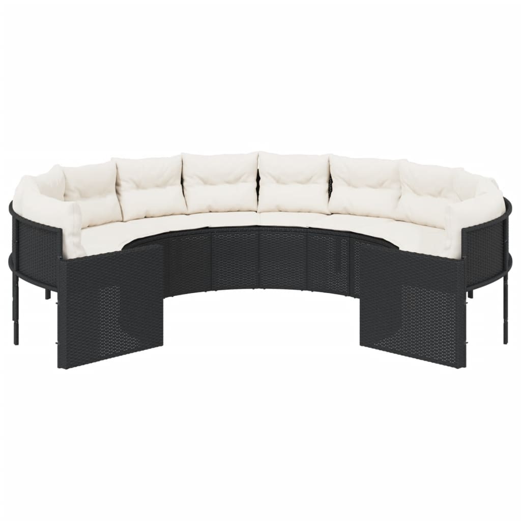Juoda poliratano sodo sofa su minkštomis pagalvėlėmis